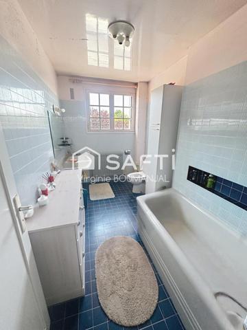Maison 6 chambres, sous sol complet et jardin clos.