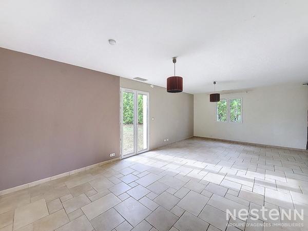 A Vendre Maison contemporaine de plain-pied de 107 m² avec garage, terrasse et jardin