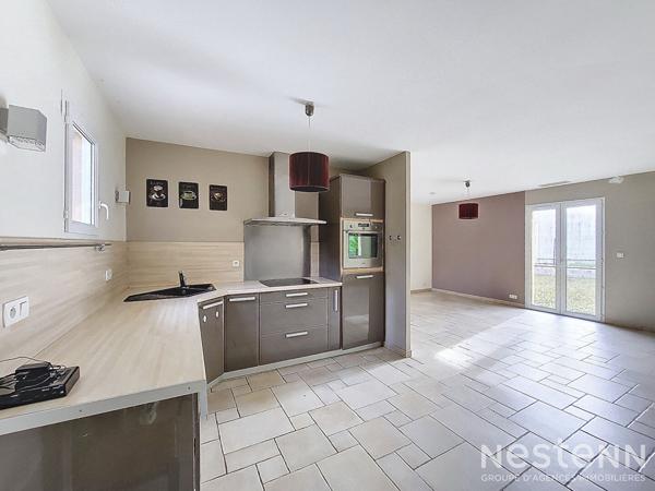 A Vendre Maison contemporaine de plain-pied de 107 m² avec garage, terrasse et jardin