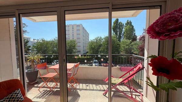 Appartement  4 pièce(s) 69.63 m2, stationnement , ascenseur, balcon