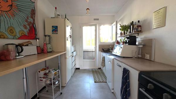 Appartement  4 pièce(s) 69.63 m2, stationnement , ascenseur, balcon