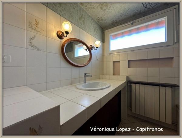 Le Passage, maison de plain-pied de 93m² avec garage, jardin et abri en dur