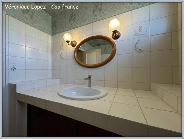 Le Passage, maison de plain-pied de 93m² avec garage, jardin et abri en dur