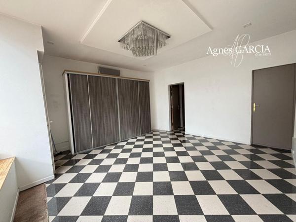 Maison avec local commercial ou professionnel