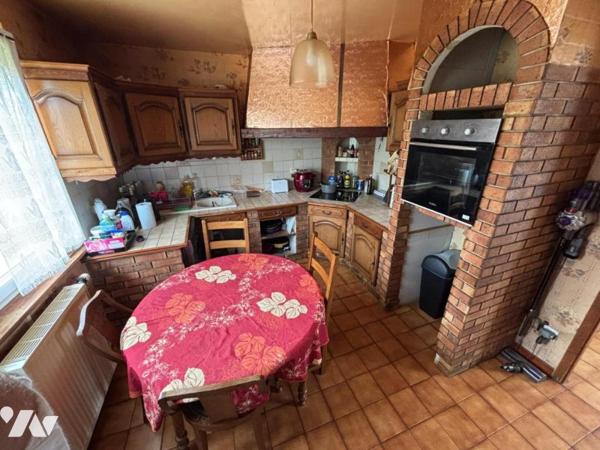 Maison 4 pièces (environ 103 m² habitables) située dans un secteur calme et prisé