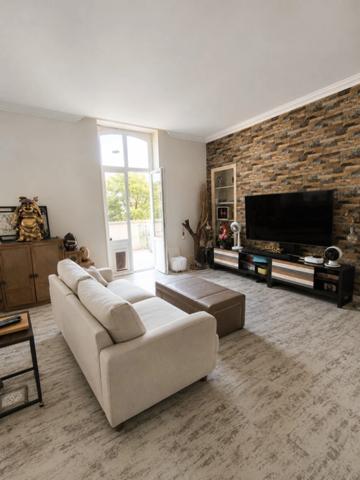"Appartement 91 m² avec Terrasse exceptionnelle de 150 m² – " Une Maison dans le Ciel " - Plein Centre Nevers
