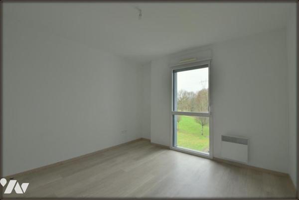 APPARTEMENT T3 AVEC ASCENSEUR GARAGE ET TERRASSE LE RHEU