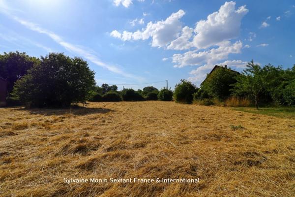 Terrain constructible de 1827 m2 proche gare et commerces