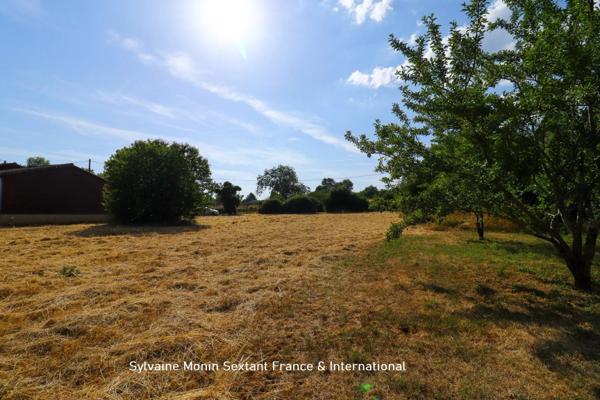Terrain constructible de 1827 m2 proche gare et commerces