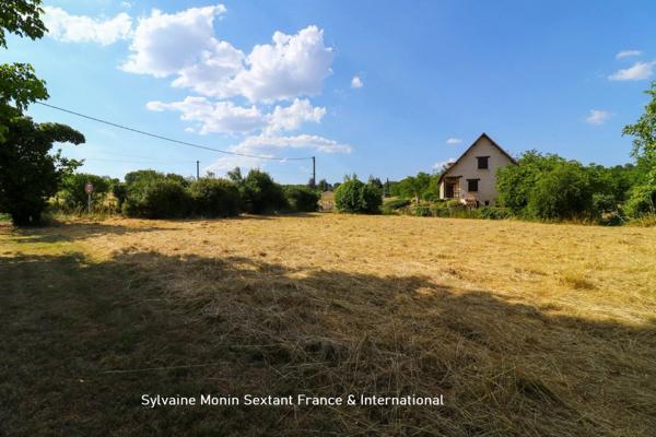 Terrain constructible de 1827 m2 proche gare et commerces