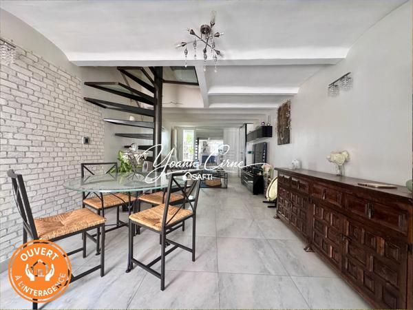 Maison de ville type 3/4 78 m2 avec terrasse, cuisine d'été et jardinet.