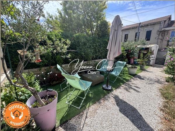 Maison de ville type 3/4 78 m2 avec terrasse, cuisine d'été et jardinet.