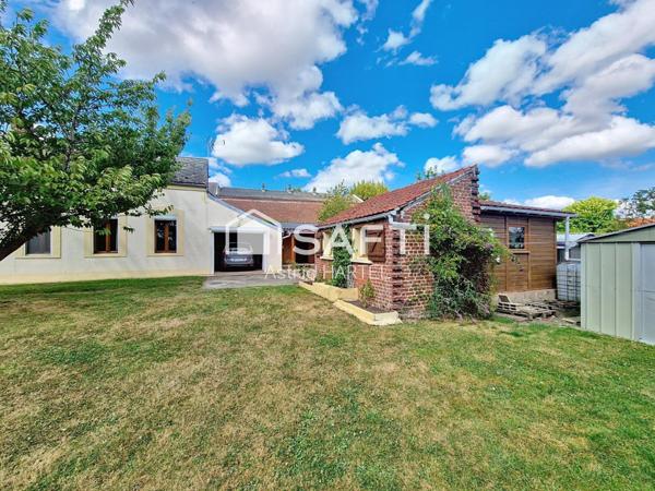 maison située en plein centre du village