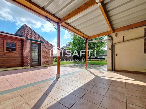 maison située en plein centre du village