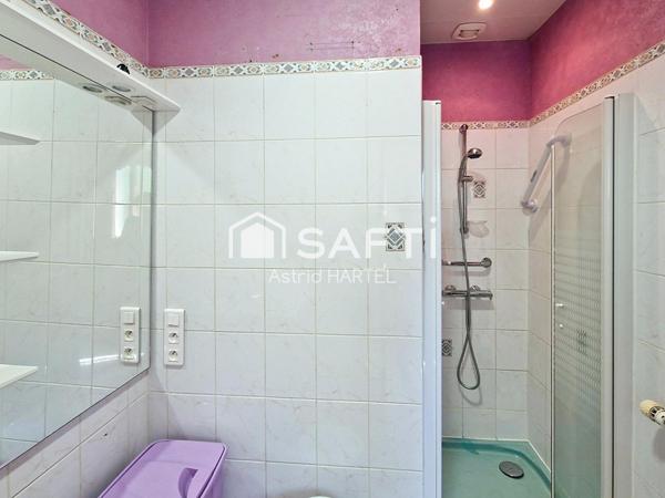 maison située en plein centre du village