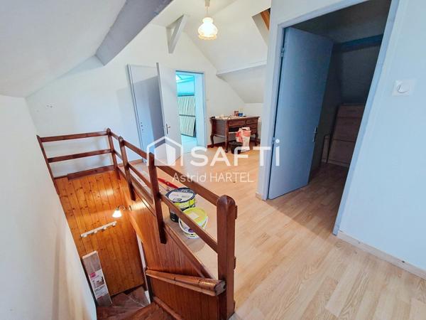 maison située en plein centre du village