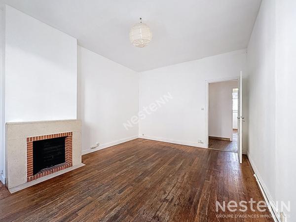 Appartement T3 - cave et droit au stationnement