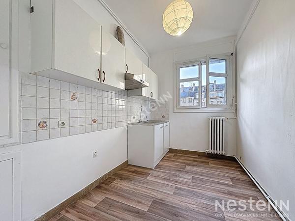 Appartement T3 - cave et droit au stationnement