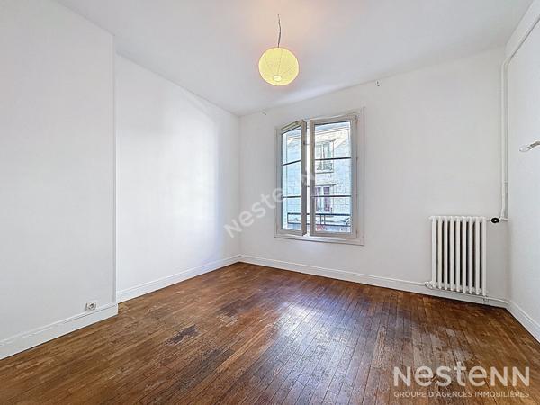 Appartement T3 - cave et droit au stationnement