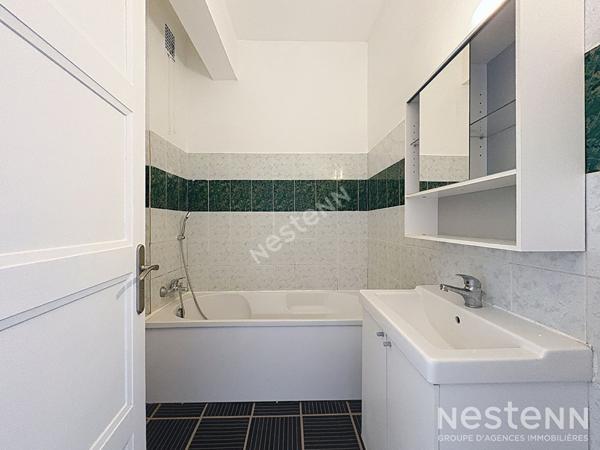 Appartement T3 - cave et droit au stationnement