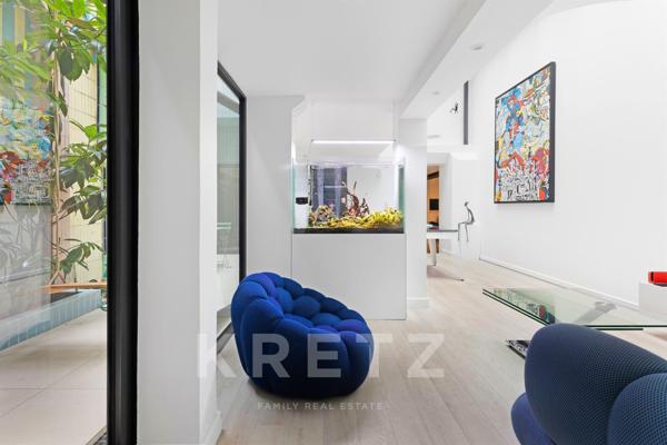 Paris 16e – Appartement de réception en rez-de-jardin avec patio