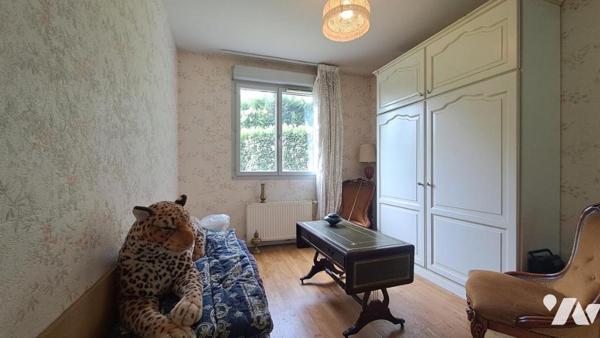 APPARTEMENT REZ-DE-JARDIN 2 CHAMBRES + GARAGE, CAVE ET PLACE DE PARKING