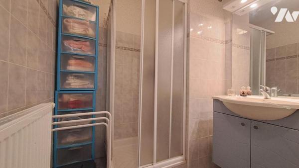 APPARTEMENT REZ-DE-JARDIN 2 CHAMBRES + GARAGE, CAVE ET PLACE DE PARKING