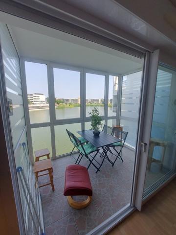 T2 meublé quartier Les Minimes avec terrasse et place de parking