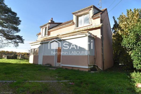 Maison à rénover avec terrain et potentiel