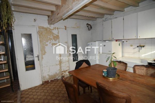 Maison à rénover avec terrain et potentiel
