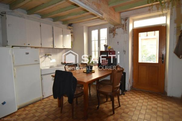 Maison à rénover avec terrain et potentiel