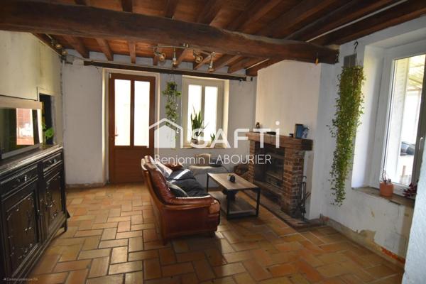 Maison à rénover avec terrain et potentiel