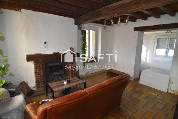 Maison à rénover avec terrain et potentiel