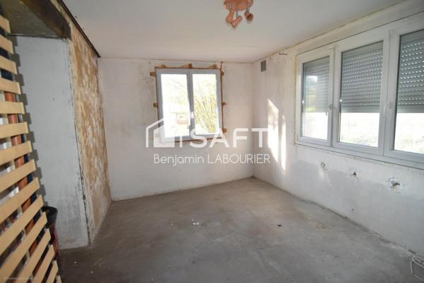 Maison à rénover avec terrain et potentiel