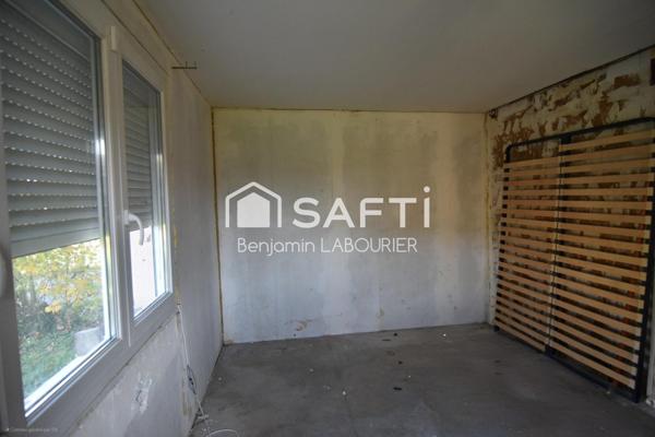 Maison à rénover avec terrain et potentiel