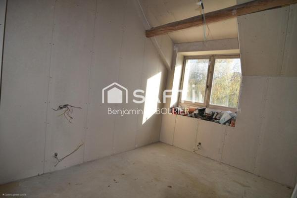 Maison à rénover avec terrain et potentiel