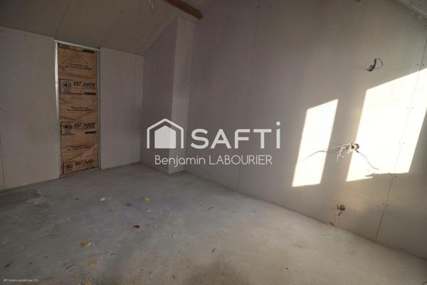 Maison à rénover avec terrain et potentiel