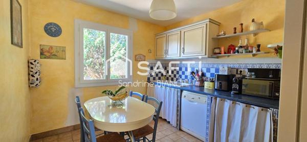 Maison de plain pied avec garage 912 m² de terrain