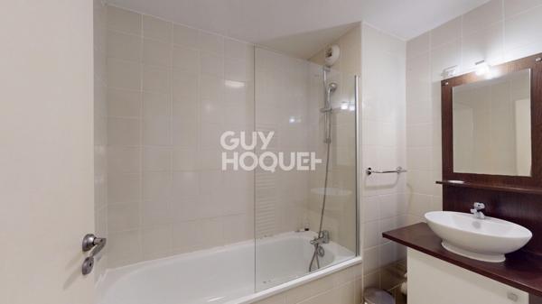 Appartement 2 pièce(s) avec PARKING COUVERT PRIVATIF