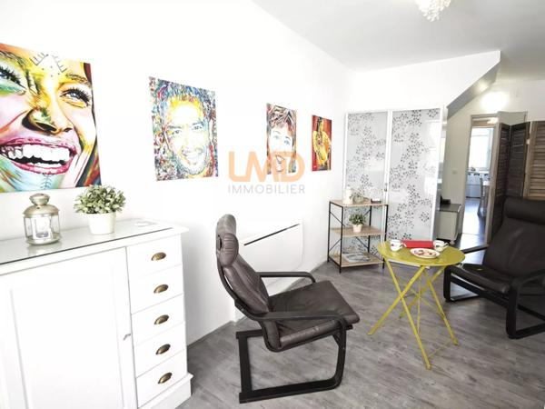 Maison de ville avec vue sur rivière