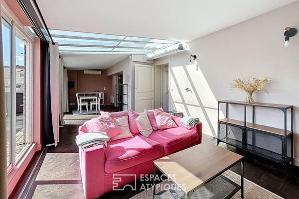 Vue sur les toits et terrasse plein sud