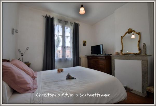 Maison de ville hyper centre, 4 chambres, 2 salles d'eau,  garage, jardin intimiste