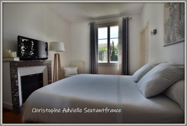 Maison de ville hyper centre, 4 chambres, 2 salles d'eau,  garage, jardin intimiste