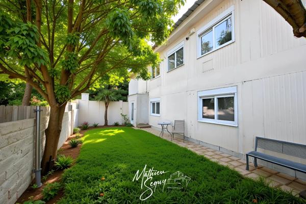 Ensemble Immobilier à St Genis Laval en zone activité, vendu libre d'occupation