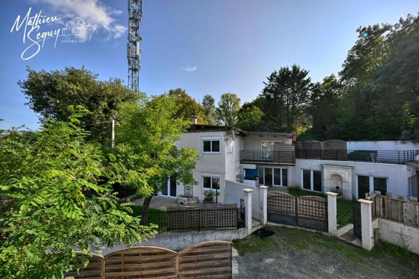 Ensemble Immobilier à St Genis Laval en zone activité, vendu libre d'occupation