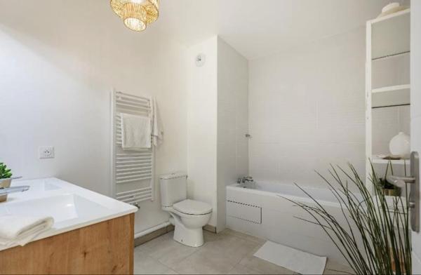 Appartement T5 avec Terrasse et Parking au dernier étage