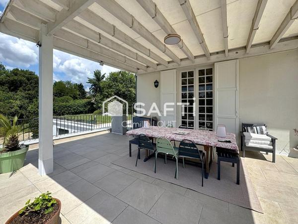 Maison familiale vue dominante et jardin arboré – Latresne