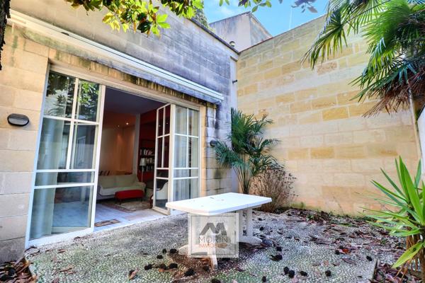 BORDEAUX entre le Jardin Public et la rue Fondaudège – à vendre appartement de plain-pied avec jardin