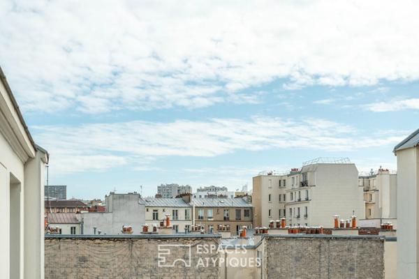 Appartement traversant en étage élevé avec ascenseur et balcon