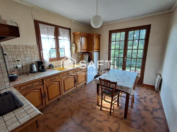 Maison avec sous sol complet en plein cœur de Villieu